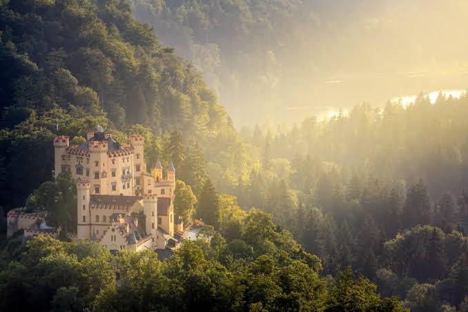 Hohenschwangau Castle in its Alpine landscape